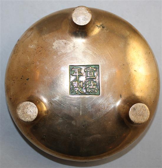 A Chinese bronze ding censer, Xuande four character mark, probably 17th / 18th century, 13.3cm